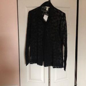 Never worn see thru black button up